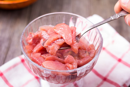 Jam pear in a bowl, on a tableの写真素材