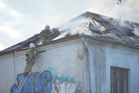 Yekaterinburg, Sverdlovsk region, Russia. June 30, 2022. Editorial. Another monument of history and culture burned down in Yekaterinburg. Courageous work of firefighters.のeditorial素材