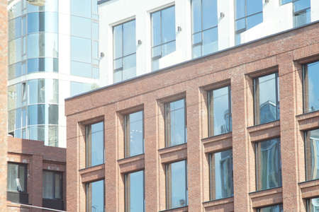 Horizontal full-color photo. Textural composition with parts of facades of city buildings. urban landscape.の写真素材