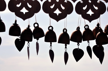 silhouette  of bells  at the temple with sky background 