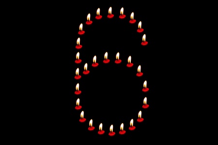 the digit  made from candlelight  on dark  backgroundの写真素材