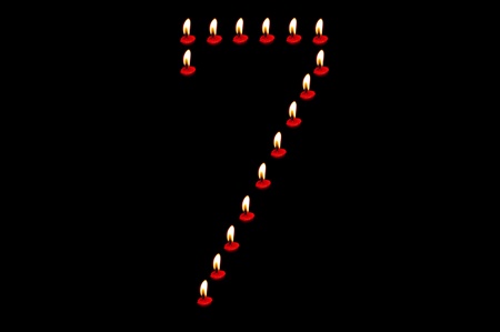 the digit  made from candlelight  on dark  backgroundの写真素材