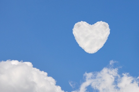heart cloud   on blue sky backgroundの写真素材