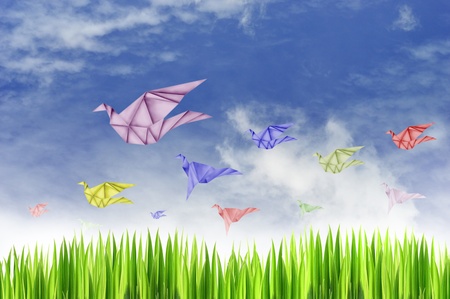 Paper birds on blue sky background ,paper birds on background,freedom symbolの写真素材