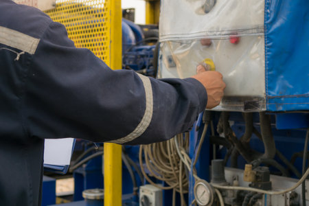 Oil and gas industry. Worker in oil and gas processing plant.