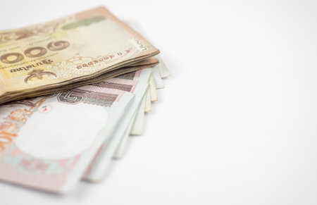 Stack of Chinese yuan banknotes on white background with copy space.の写真素材