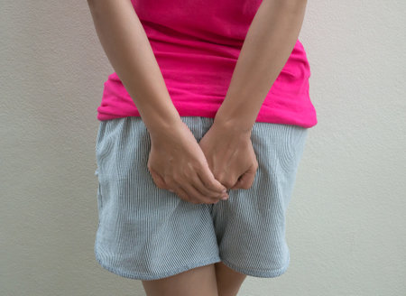 Woman suffering from pain in her knee joint. Health care concept.の写真素材