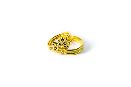Gold ring on a white backgroundの写真素材