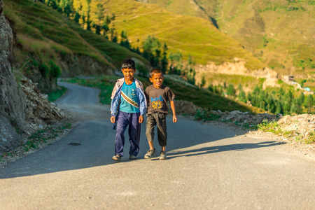 Tehri Garhwal, Uttrakhand, India - October 5, 2018 : Portrait of 2 Boy in Himalayasのeditorial素材