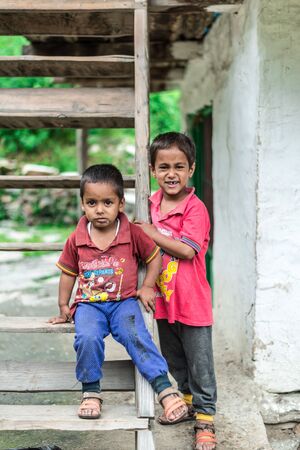 Kullu, Himachal Pradesh, India - August 06, 2018 : Photo of himachali children near their house, on the street in Himalayan village, Sainjのeditorial素材