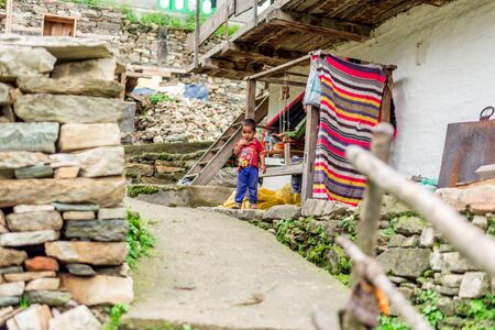 Kullu, Himachal Pradesh, India - August 06, 2018 : Photo of himachali children near their house, on the street in Himalayan village, Sainjのeditorial素材