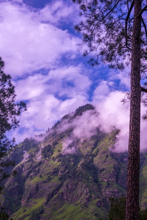Photo of mountain range view. Timelapse Of Moving Clouds And Fog over Himalayan mountain range in...