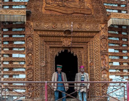 Kullu, Himachal Pradesh, India - September 01, 2018 : Photo of himachali old men at temple on the street in Himalayan village, Indiaのeditorial素材