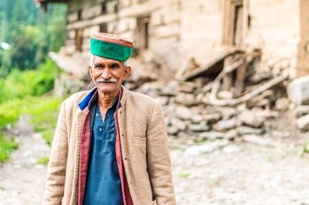 Kullu, Himachal Pradesh, India - September 01, 2018 : Portrait of himachali Old Man on the street in Himalayan village, Indiaのeditorial素材
