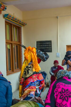 Spiti, Himachal Pradesh, India - March 24, 2019 : Photo of lama wearing dress for mask dance in...