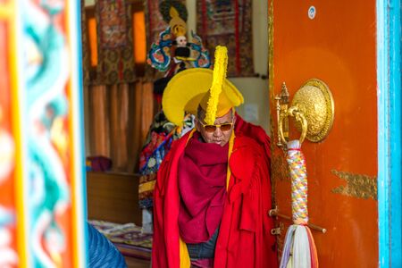 Spiti, Himachal Pradesh, India - March 24, 2019 : Photo of lama wearing dress for mask dance in himalayas -のeditorial素材