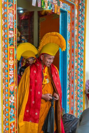 Spiti, Himachal Pradesh, India - March 24, 2019 : Photo of lama wearing dress for mask dance in himalayas -のeditorial素材