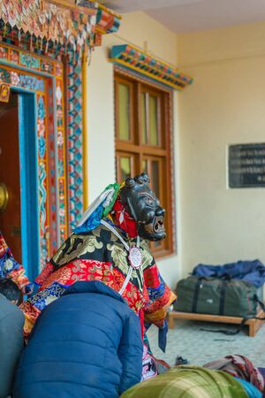 Spiti, Himachal Pradesh, India - March 24, 2019 : Photo of lama wearing dress for mask dance in himalayas -のeditorial素材
