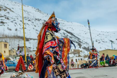 Spiti, Himachal Pradesh, India - March 24, 2019 : Tibetan buddhist lamas dressed in mystical mask dance Tsam mystery in time of festivalのeditorial素材