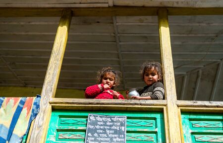 Kullu, Himachal Pradesh, India - April 01, 2019 : Photo of Kids in their house in Himalayan village -のeditorial素材
