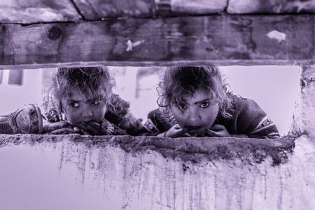 Kullu, Himachal Pradesh, India - April 01, 2019 : Photo of Kids in their house in Himalayan village -のeditorial素材