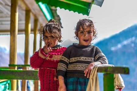 Kullu, Himachal Pradesh, India - April 01, 2019 : Photo of Kids in their house in Himalayan village -のeditorial素材