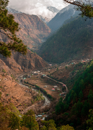 Colorful landscape with high Himalayan mountains, green forest, blue sky with clouds in summer in India -の写真素材