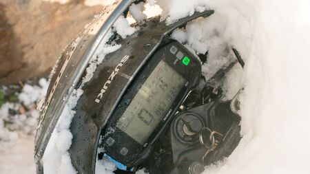 Kullu, Himachal Pradesh, India - Feburuary 08, 2019 : Snow covered Bike Speedometer in mountains -のeditorial素材