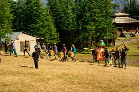 Kullu, Himachal Pradesh, India - February 13, 2018 : Local People doing worship local God Devta in Himalayas -のeditorial素材