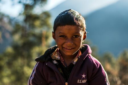 Kullu, Himachal Pradesh, India - January 17, 2019 : Portrait of boy in mountain Himalayan peopleのeditorial素材