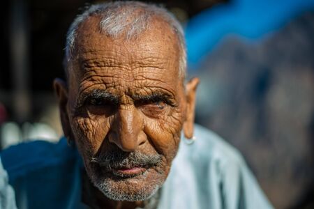 Kullu, Himachal Pradesh, India - January 17, 2019 : Portrait of old man in mountain, Himalayan peopleのeditorial素材