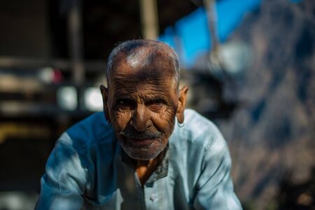 Kullu, Himachal Pradesh, India - January 17, 2019 : Portrait of old man in mountain, Himalayan peopleのeditorial素材