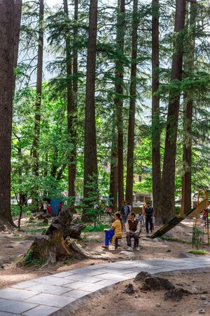 Manali, Himachal Pradesh, India - May 07, 2019 : Photo of Tourist enjoying in van vihar national park in himalayasのeditorial素材