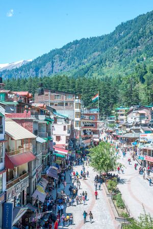 Kullu, Himachal Pradesh, India - May 29, 2019 : People roaming on the mall road in himalayas -のeditorial素材