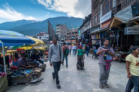 Kullu, Himachal Pradesh, India - May 29, 2019 : People roaming on the mall road in himalayas -のeditorial素材