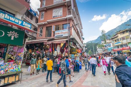 Kullu, Himachal Pradesh, India - May 29, 2019 : People roaming on the mall road in himalayas -のeditorial素材