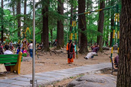 Manali, Himachal Pradesh, India - May 07, 2019 : Photo of Tourist enjoying in van vihar national park in himalayasのeditorial素材