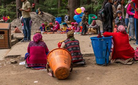 Manali, Himachal Pradesh, India - May 27, 2019 : Local Seller at Hidimda Devi Temple in Manali,...