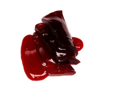 This is a photo of fruit jelly with strawberry sauceの写真素材