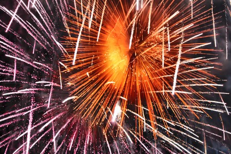 red fireworks in sky at night