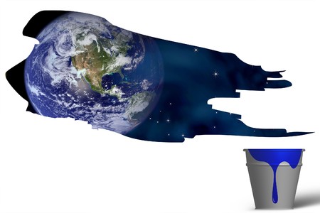 Picture of painted landscape with pail of blue paintの写真素材