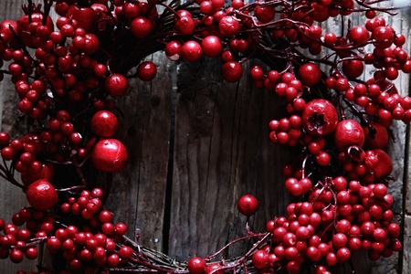 Photo of christmas garland on wooden backgroundの写真素材