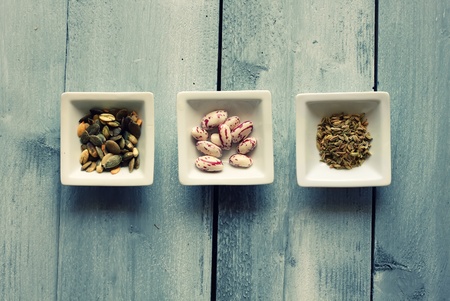 Photo of 3 bowls with seeds and beansの写真素材