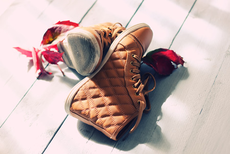 Photo of shoed on wooden backgroundの写真素材