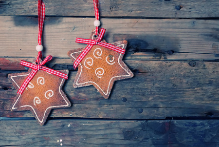 Photo of christmas cookie decoration on wooden background