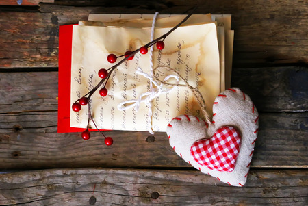 Photo of old letters and heart shape decoration