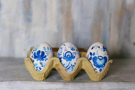 Cute retro photo with blue easter eggsの写真素材