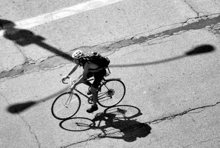 Young man riding a black and white photoのeditorial素材