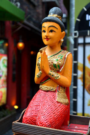 Kneeling Thai woman sculptureのeditorial素材