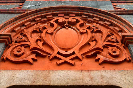Carved door arches on bricks wallの写真素材